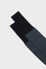 Close-up of the Lusitanian majolica inspired pattern and handmade bow on the toe of Bresciani Mattia socks, in navy jeans blue.