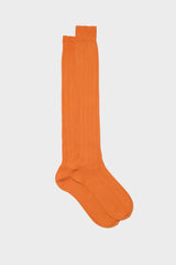 Bresciani Massimo long socks in Pima cotton, not mercerized for superior softness, with a ribbed knit texture and a solid orange color.