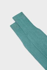 Close-up of the ribbed cuff on Bresciani Lorenzo socks, in a solid mint green color.