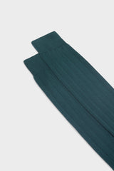 Close-up of the ribbed knit and hand-linked toe on Bresciani Massimo socks, in a solid forest green color.