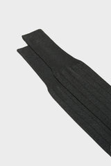Close-up of the ribbed knit and cuff on Bresciani Leone socks, in a solid dark grey color.