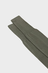 Close-up of the ribbed cuff on Bresciani Lorenzo socks, in a solid medium grey color.