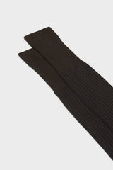 Close-up of the fine ribbed texture on the cuff of Bresciani Mario socks, in a brown blue color.