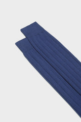 Close-up of the ribbed knit and hand-linked toe on Bresciani Massimo socks, in a solid blue color.
