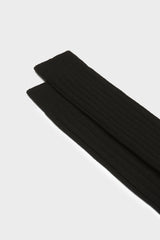 Close-up of the ribbed knit and fine texture of Bresciani 'Campidoglio' socks, in a solid black color.