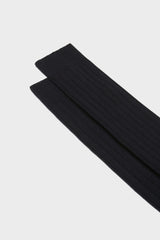 Close-up of the ribbed knit and fine texture of Bresciani 'Campidoglio' socks, in a solid navy color.