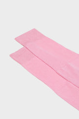 Close-up of the ribbed cuff on Bresciani Lorenzo socks, in a solid pink color.