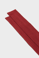 Close-up of the ribbed cuff on Bresciani Cesare socks, highlighting the high cuff and solid cherry color.