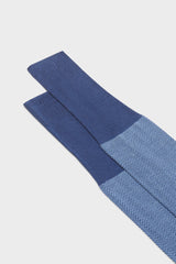 Close-up of the herringbone pattern and the high cuff on Bresciani Giulio socks, in  jeans sea blue color .